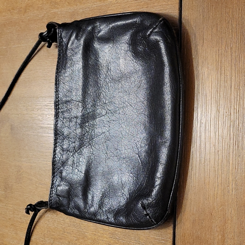 ADORABLE LITTLE BLACK LEATHER BAG.